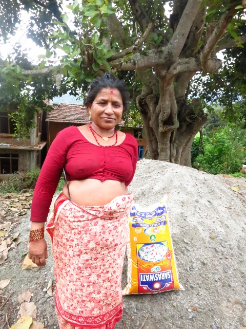fchv with distributed rice bag.jpg